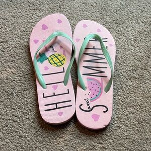 Cute pink flip flops never worn
